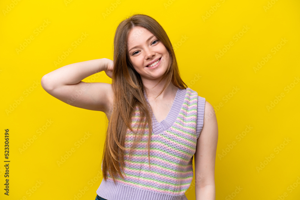 Obraz premium Young caucasian woman isolated on yellow background laughing