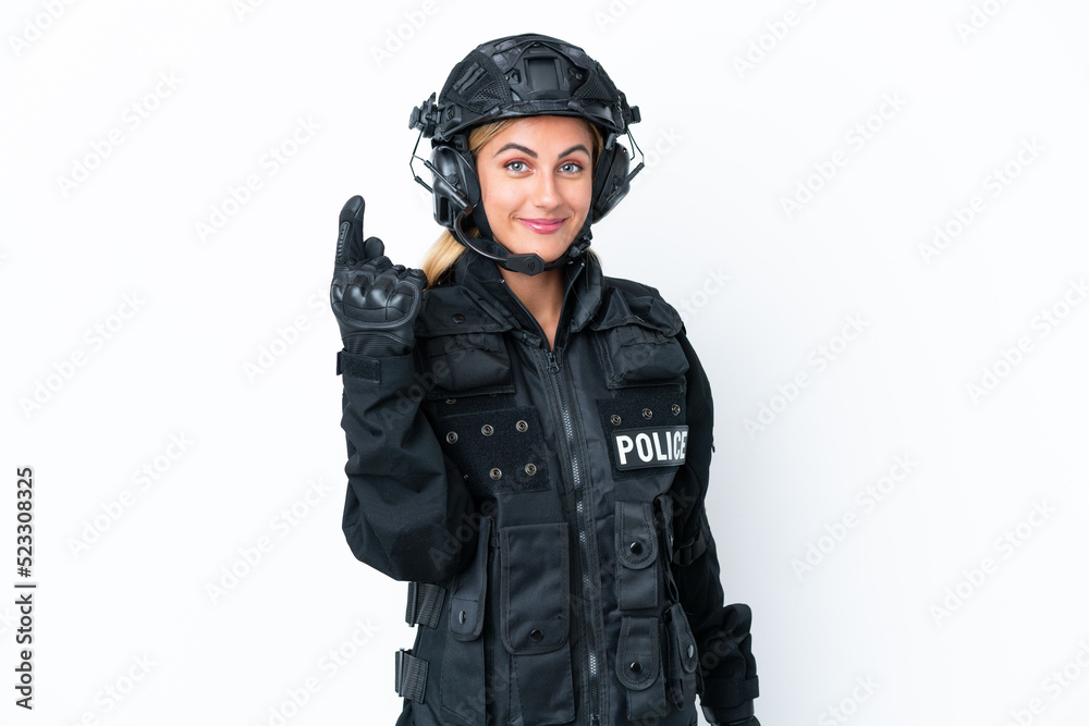 SWAT caucasian woman isolated on white background pointing with the index finger a great idea
