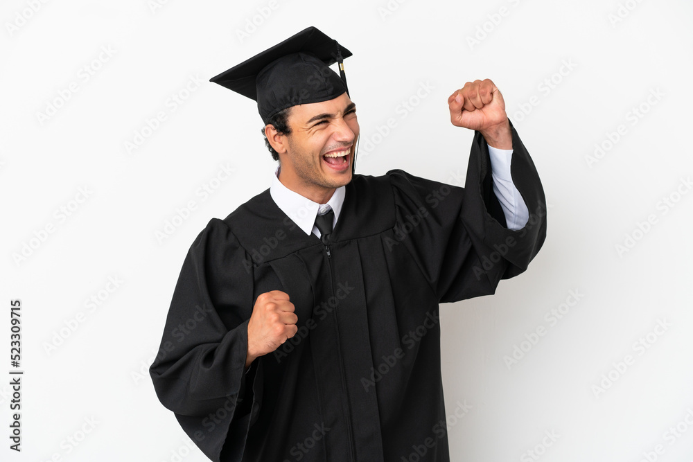 Young university graduate over isolated white background celebrating a victory Young university graduate over isolated white background celebrating a victory