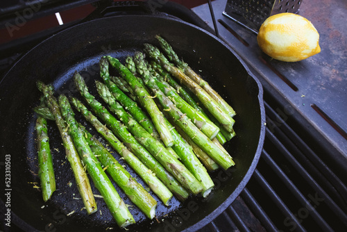 Asparagus Grilled in a Cast Iron Skillet at a Summer Outdoor BBQ