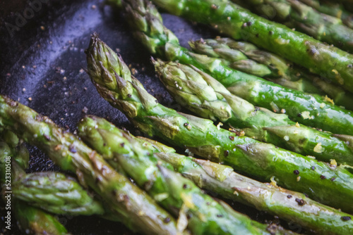 Asparagus Grilled in a Cast Iron Skillet at a Summer Outdoor BBQ