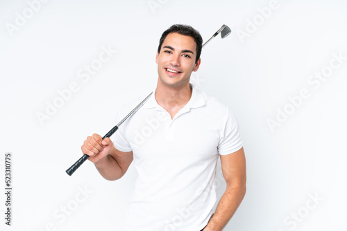 Young caucasian man isolated on white background playing golf