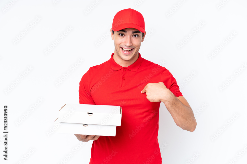 Pizza delivery caucasian man with work uniform picking up pizza boxes isolated on white background with surprise facial expression Pizza delivery caucasian man with work uniform picking up pizza boxes isolated on white background with surprise facial expression