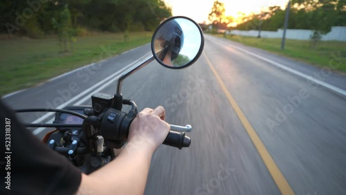 driving on the road ,Motorcycle driver riding having fun driving the empty highway on a motorcycle tour journey