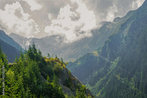 Beautiful landscape of high green mountains and turns of Transfagarasan road, is one of the most beautiful roads in the world. Carpathians. Romania. photo