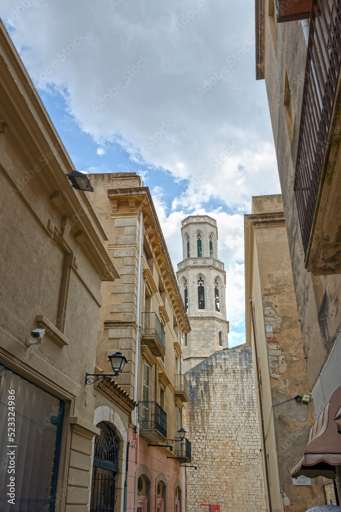 Llers Street and Church of Sant Pere in Figueres, Spain.