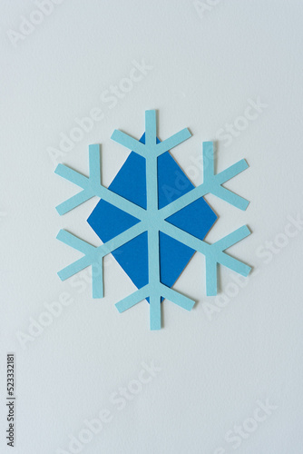 snowflake icon on blue and white background