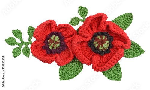Crocheted poppies flowers and leaves isolated on a white background.
