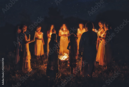 Women at the night ceremony. Ceremony space. photo