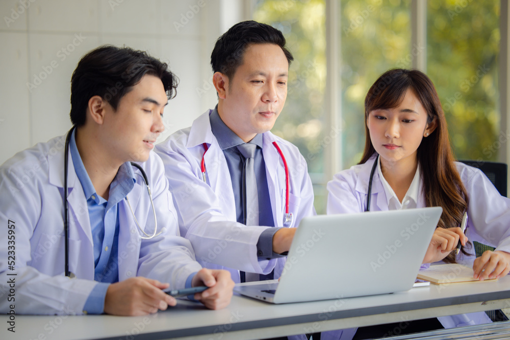 Doctor using online health consulting on computer pc and digital tablet, Tele medical healthcare concept Doctor using online health consulting on computer pc and digital tablet, Tele medical healthcare concept