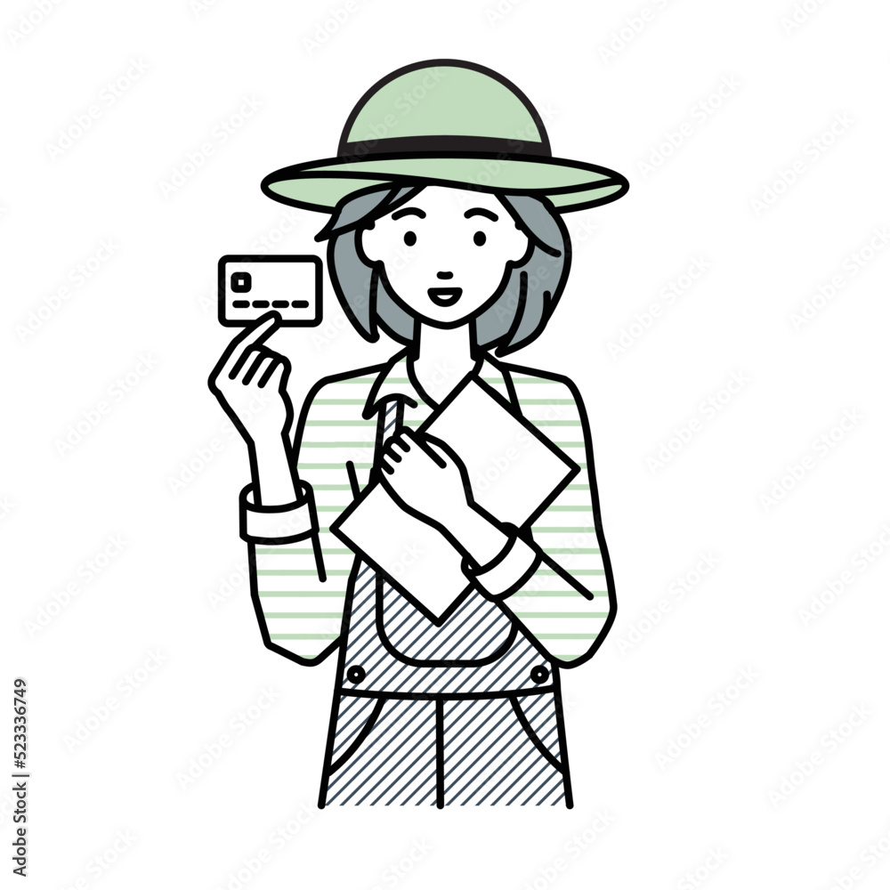 立って書類とカードを手に持つ農家の女性 立って書類とカードを手に持つ農家の女性