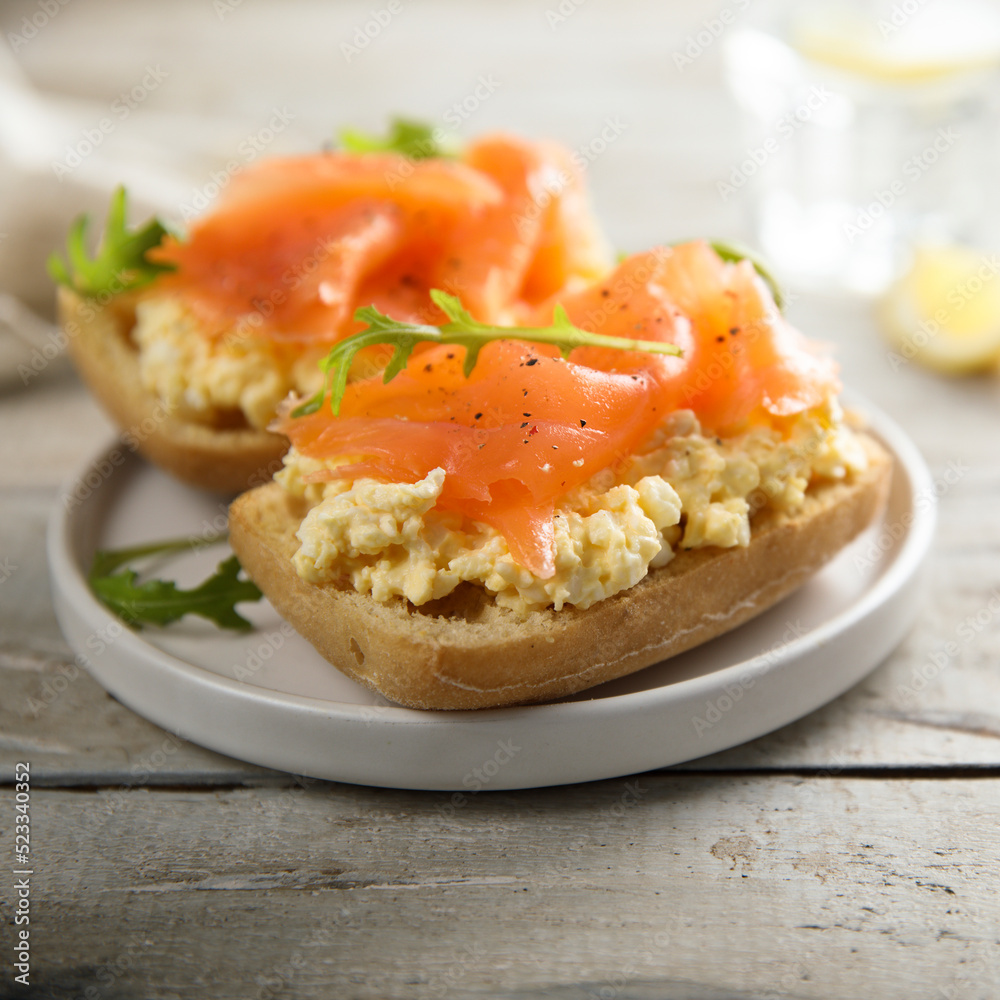 Scrambled eggs on toast with smoked salmon Scrambled eggs on toast with smoked salmon