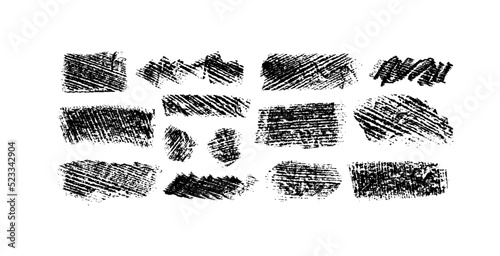 Wide charcoal strokes with imprint texture. Dry black straight lines isolated on white background. Set of vector grunge graphite pencil strokes. Black charcoal thick smears with grunge texture.