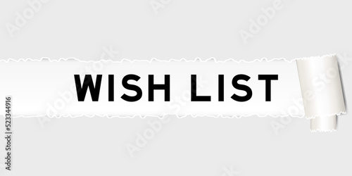 Ripped gray paper background that have word wish list under torn part