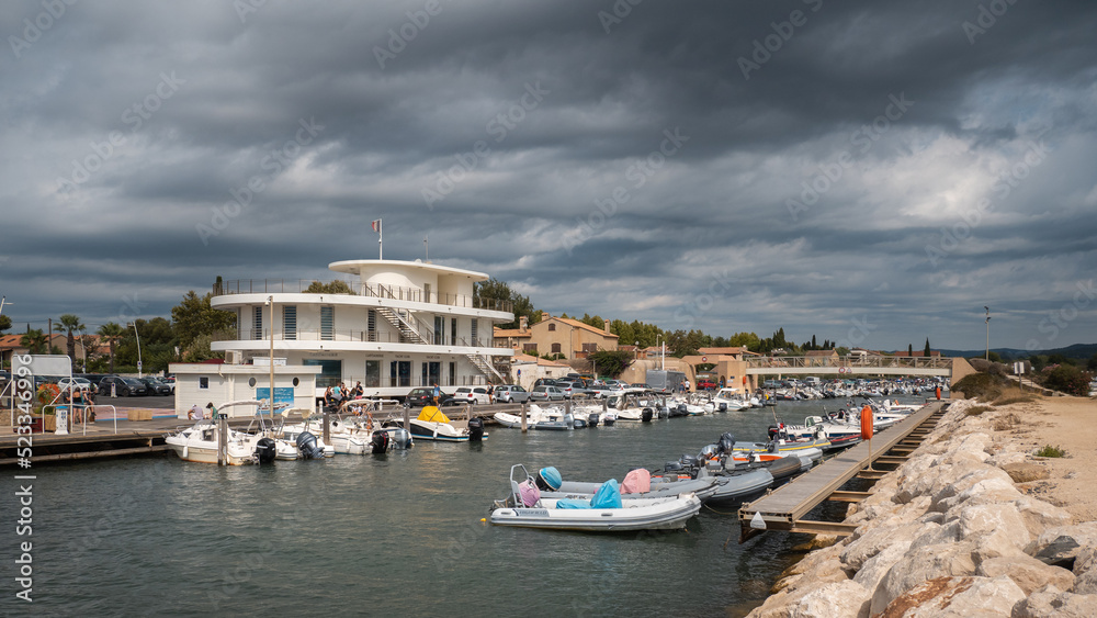 Harbor master's office and boat channel view at La Londe les Maures near Porquerolles Island in Var, France