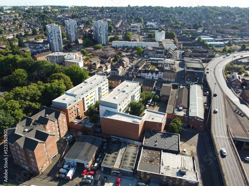 High Angle Drone's View of Luton City Center and Railway Station, Luton England. Luton is town and borough with unitary authority status, in the ceremonial county of Bedfordshire photo