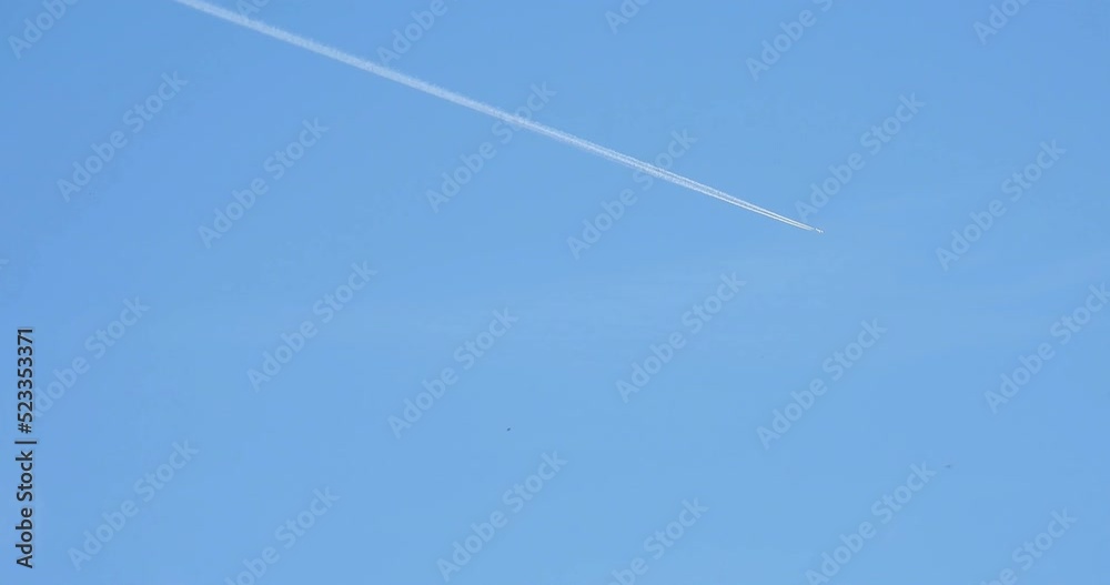Airplane flying in the sky and leaving trail Airplane flying in the sky and leaving trail