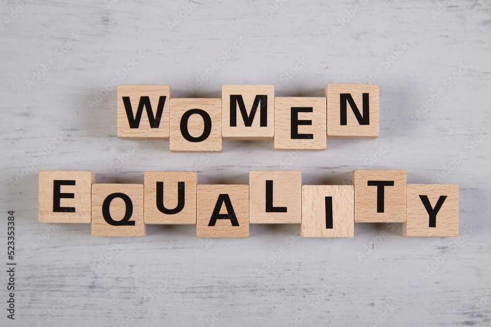 wooden blocks building the word women equality wooden blocks building the word women equality