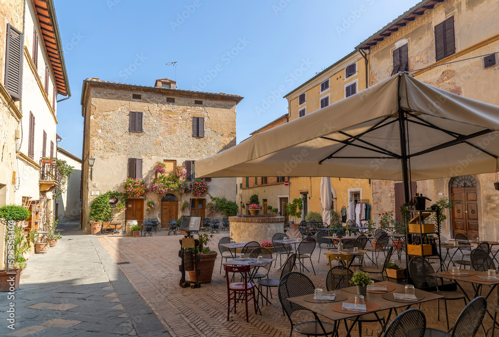 Cozy town square with restaurant in Pienza