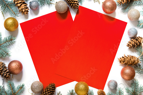 new year background, frame from christmas decoration on white background, red paper for your text