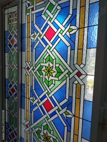 out of focused Multicolored stained glass pattern. Stained Glass Window with selective focused