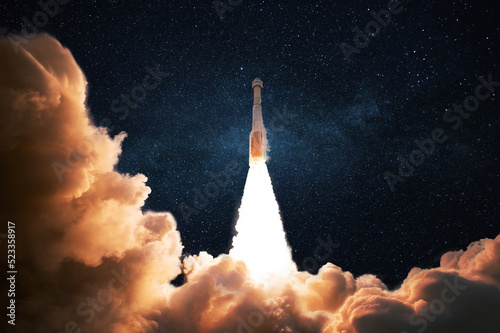Space rocket with puffs of smoke successfully lift off into the starry sky. Spacecraft flies into outer space. Successful start of space mission and exploration, concept