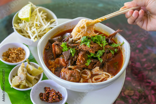 Thai rice noodles with (northern) Lanna curry called nam ngio. Thai food