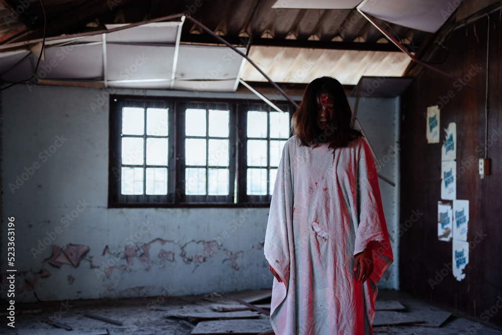 Ghost girl is in an abandoned house dressed in a scary white dress. Bloody lights and red eyes.
