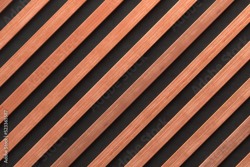 A wooden lamella wall in the color of natural wood with a pattern of wall panels in the background.