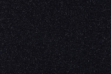 Dark black monochrome handmade glitter texture background, sparkling shiny wrapping paper for Christmas holiday seasonal wallpaper decoration, greeting and winter Christmas design element.