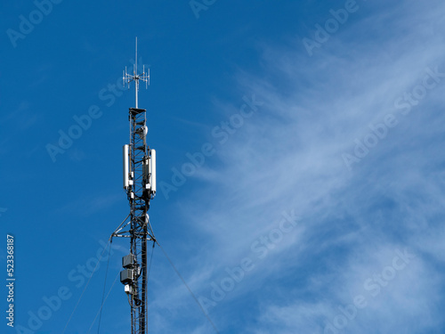 Communication antenna on a blue sky background