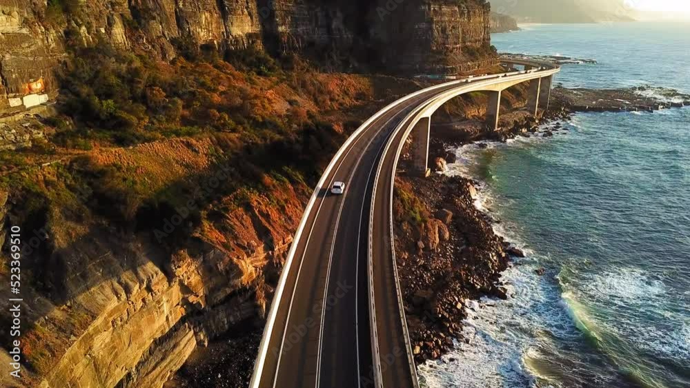 Aerial Forward Shot Of Cars Moving On Sea Cliff Bridge - New South Wales, Australia