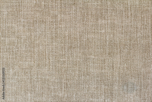 Natural grey cotton fabric as a background.