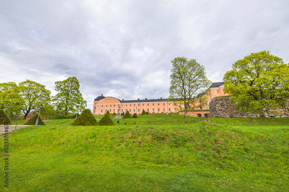 Obraz premium Beautiful view of Royal Palace with green lawn to building in foreground. Sweden.
