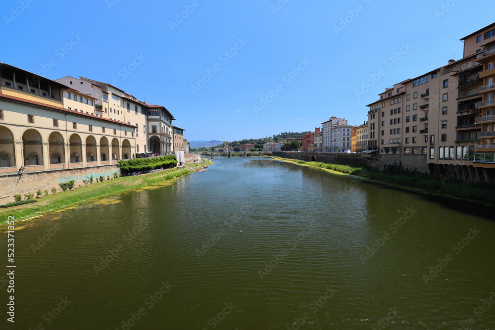 Scenic view looking towards Ponte Alle Grazie on a Sunny Day. Florence. Italy.