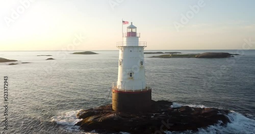 07/10/2022 - Little Compton, RI USA - Early morning video of the Sakonnet Point Light (West Island Light) between Little Compton and Tiverton Rhode Island, at Sakonnet River and Atlantic Ocean.	 photo