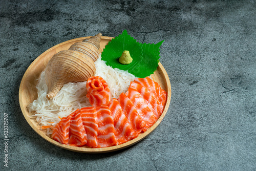 set of fresh raw salmon on wooden board disk with wasabi copy space, Fresh Salmon fish fillet.