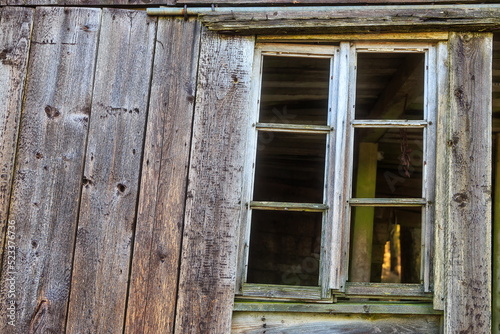 old window in the wooden wall