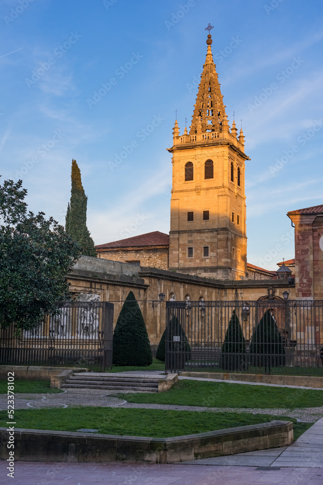 Kings garden and Las Pelayas monastery tower at sunset in Oviedo old town.