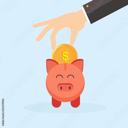 A man puts a coin in a piggy bank. The topic of savings.