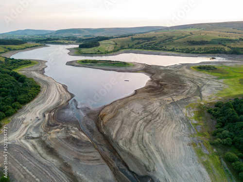 Drought conditions are shown through drone shots of Stocks Reservoir Hodder valley in the Forest of Bowland, Lancashire, England. August 2022 photo