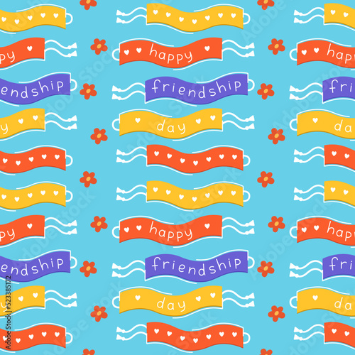 Happy friendship day seamless pattern. Friendship bracelets on blue background vector flat illustration. Three wristbands with congratulatory title