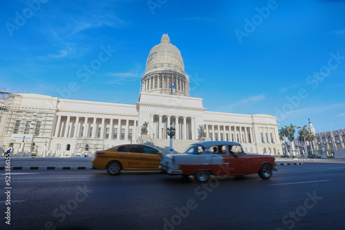 Capitolio building Havana, Cuba with vintage old american cars © AJITH.A