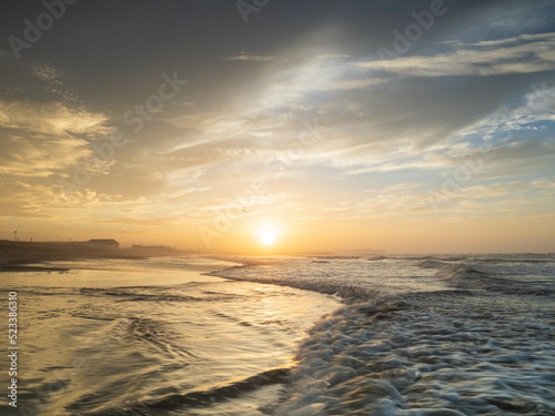 Sunset sky clouds background. Beautiful landscape with clouds and orange sun on sky. High quality photo