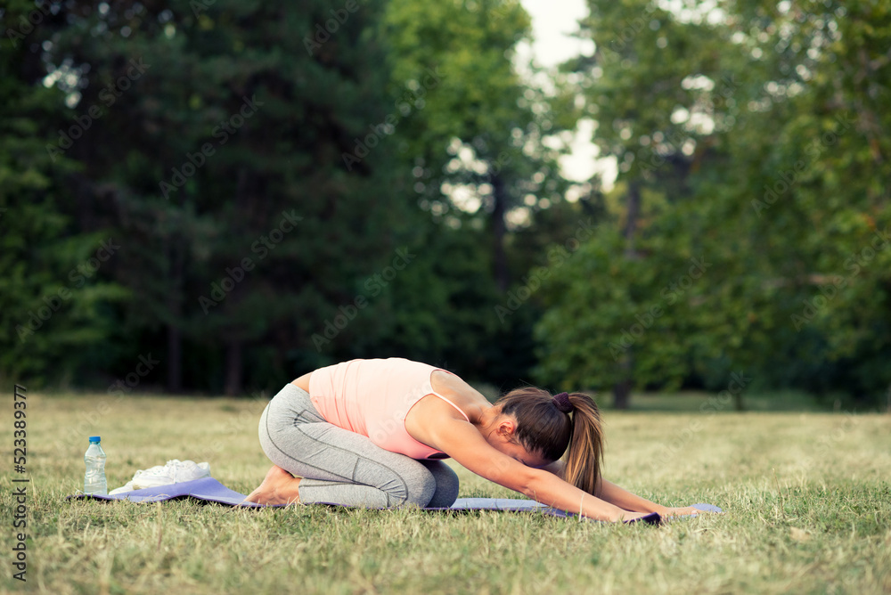 Young fitness woman exercise in summer nature Young fitness woman exercise in summer nature