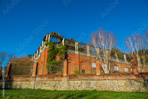 Hampstead Hill Garden and Pergola. Georgian arbour and terrace public gardens in London. The pergola is made up of columns with plants growing on it.