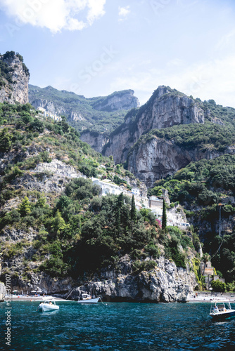 Mountainous Coastline Cliffs with Boats in Water