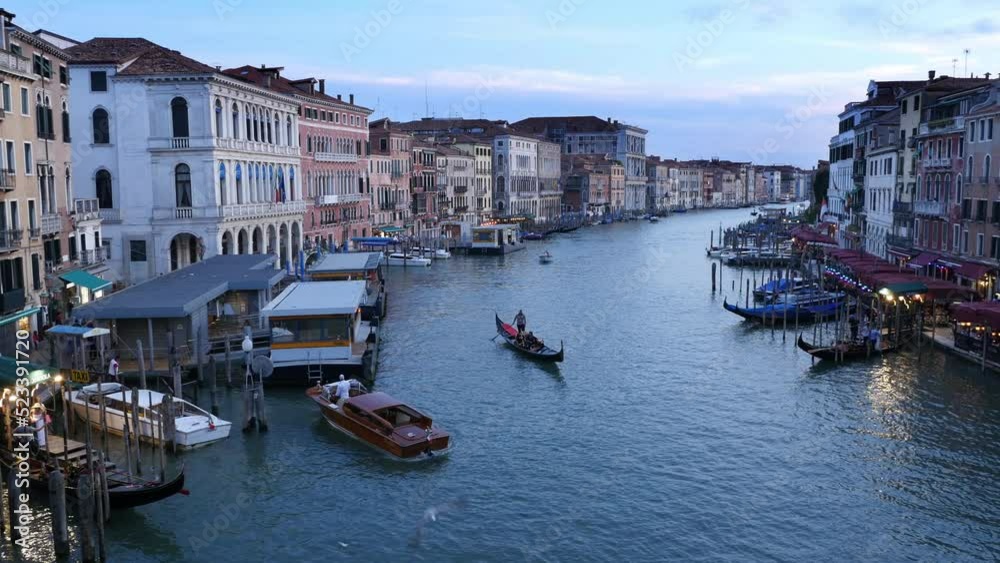 Venice, Italy. Evening view from the Rialto bridge on the Grand Canal. Venice, Italy. Evening view from the Rialto bridge on the Grand Canal.