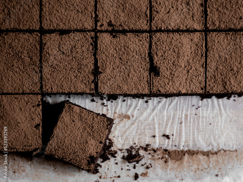 Chocolate brownie pieces on a tray