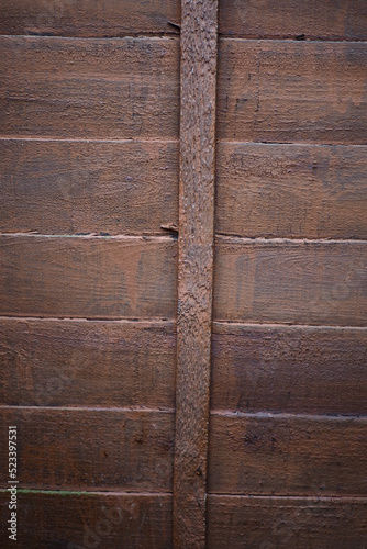 texture background of wooden garden fence and shed door 